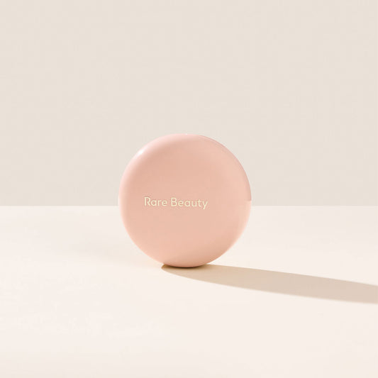 Rare Beauty Positive Light Enlumineur Exhilarate champagne gold